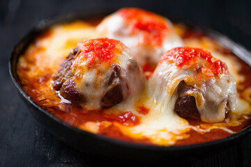 rustic american italian cheesy meatball in tomato sauce