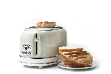 Retro toaster and a toasted slices of bread with Several slices of white bread prepared for breakfast. Crispy toast is spread on a plate isolated on white background

