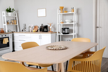 Dining table in kitchen interior