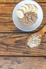 oatmeal with banana - vegan and healthy whole grains breakfast