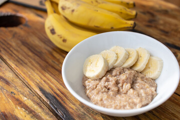 oatmeal with banana - vegan and healthy whole grains breakfast