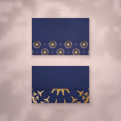 Business card template in dark blue with vintage gold pattern for your personality.