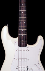 Fototapeta premium White electric guitar on a dark background close up