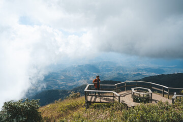 Man standing on a high viewpoint in Doi Inthanon park