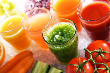 Glasses with fresh organic vegetable and fruit juices