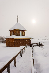 Christian chapel in the winter season. Too much snow.