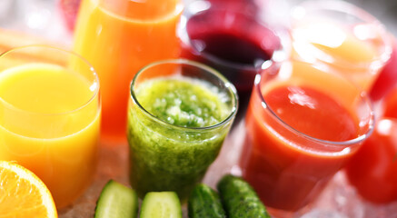 Glasses with fresh organic vegetable and fruit juices