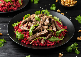 Bulgur salad with beetroot and roast beef. Healthy diet food