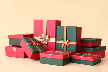 Christmas gift boxes on beige background