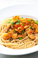 spaghetti with poultry meat, tomato sauce and beans
