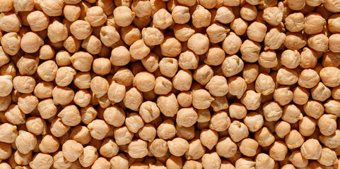 Raw dried chickpeas. Uncooked dried chickpeas. Texture background. Food background. Healthy eating. Top view.