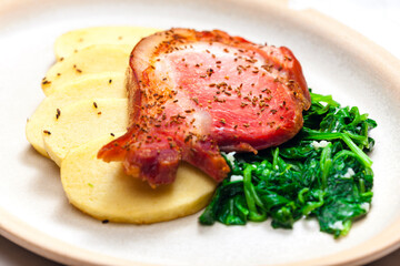 smoke meat with spinach and potato dumplings