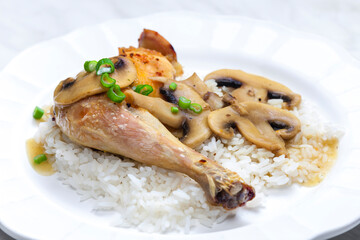 chicken leg with mushrooms and rice
