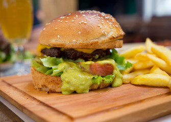 burger with guacamole sauce background