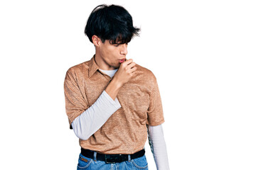 Handsome hipster young man wearing 90s retro style feeling unwell and coughing as symptom for cold...