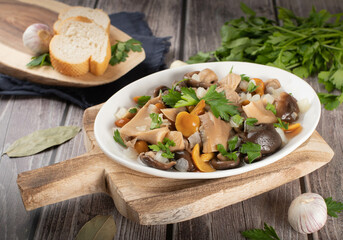 Marinated forest mushrooms with onion and greens