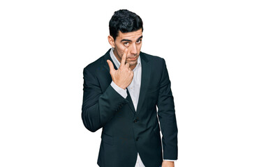 Fototapeta premium Handsome hispanic man wearing business clothes pointing to the eye watching you gesture, suspicious expression