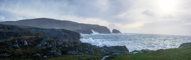 Naklejka na ściany i meble Stormy sea, waves crashing in West Cork, Wild Atlantic way, Ireland