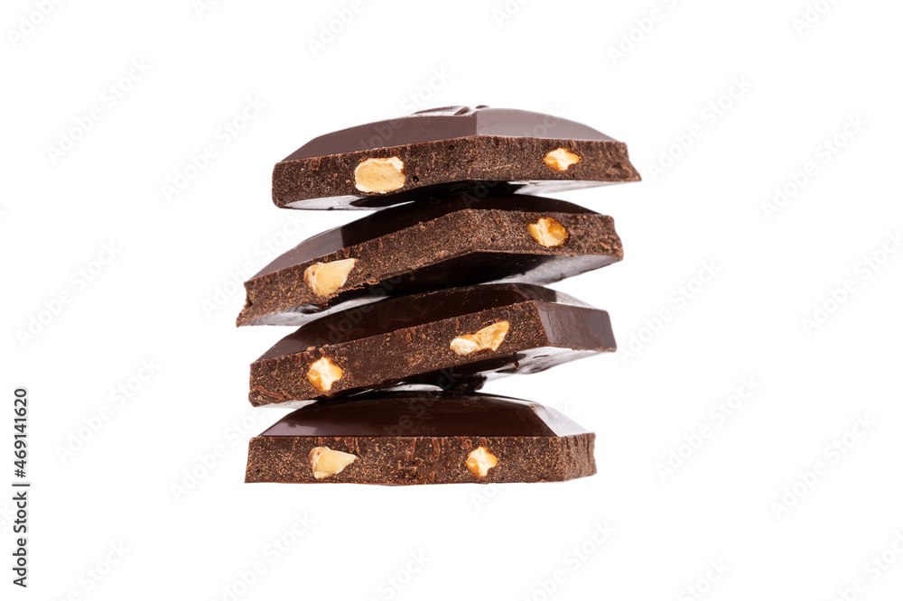 Aufkleber pieces of chocolate with nuts on top of each other in isolation on a white background