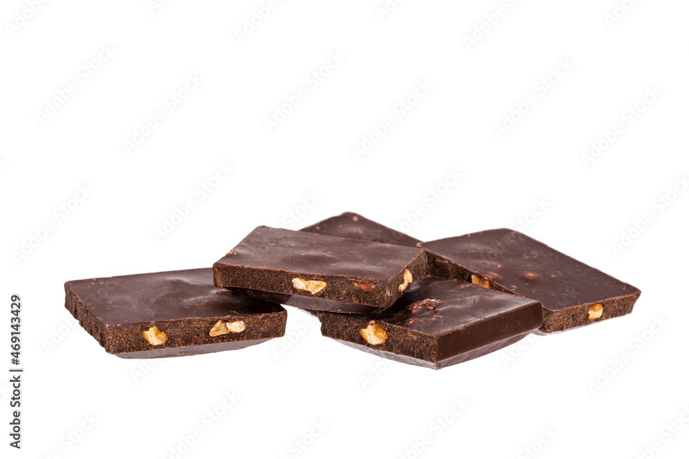 Poster pieces of dark chocolate with nuts lie side by side isolated on white background