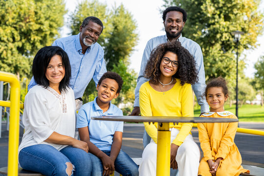 Beautiful Happy African American Family Bonding At The Park