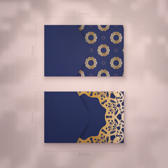 Dark blue business card template with Greek gold ornaments for your personality.