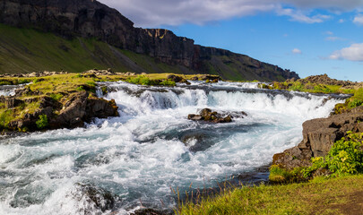 Fototapeta na wymiar waterfall in the mountains, Iceland