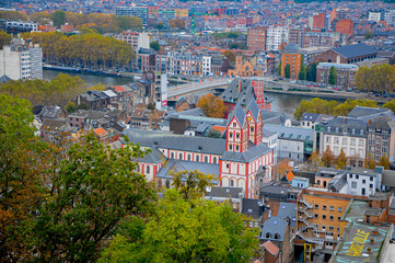Close-up of Liege, Belgium with Meuse river, Collegiate Church of St. Bartholomew & the Grand Curtius Museum