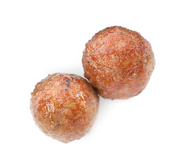 Tasty cooked meatballs on white background, top view