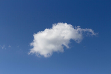 Naklejka na ściany i meble Cloud in the blue sky