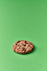 Delicious chocolate cookie on a green background