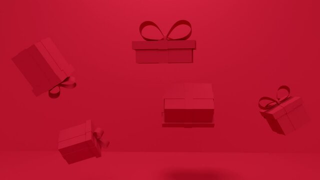 Levitating gifts with a bow on a red background. Minimal modern seamless motion design. Abstract loop animation