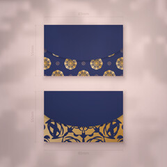 Presentable dark blue business card with vintage gold ornaments for your brand.