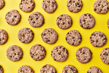  Delicious chocolate cookies on a yellow background