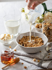 breakfast, muesli with banana, honey and milk