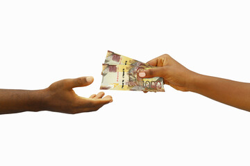 Hand giving 3D rendered Kenyan shilling notes to another hand. Hand receiving money