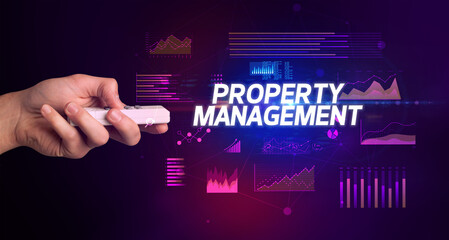 hand holding wireless peripheral, cyber business concept