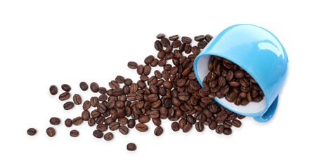 Overturned cup with roasted coffee beans on white background, top view