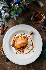 Roasted goose legs with spices. Cooking at Christmas time