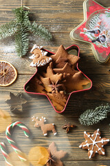 Christmas cookies in a metal box in the form of an asterisk. biscuits in the form of deer and...