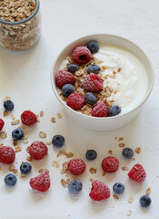 Yogurt with granola and fruit. Healthy breakfast.