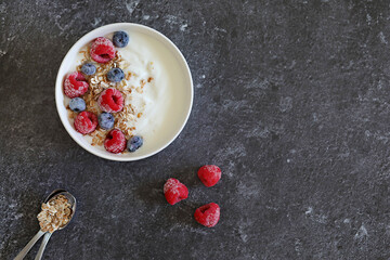 Yogurt with granola and fruit. Healthy breakfast.