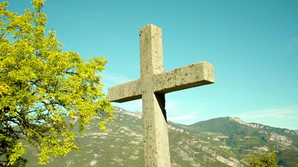 A photo of a cross in nature