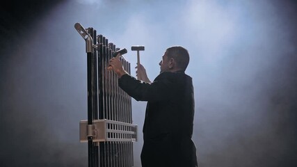 Musician play the chime bells
