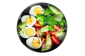salad vegetables and egg, broccoli, tomato, cucumber, meal snack on the table copy space food background keto or paleo diet
