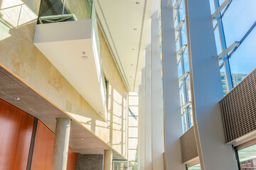 Painted in brown. Abstract fragment of the architecture of modern lobby, hallway of the luxury hotel, shopping mall, business center in Vancouver, Canada. Interior design.