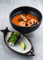 Thai soup Tom Yam with langoustine