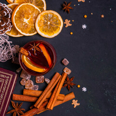 Fototapeta na wymiar Gluhwein sweet hot warm Mulled red Wine or punch tea in mug cup glass spices citrus aromatic cinnamon star anise German tradition winter Christmas market beverage drink new year holidays festival