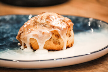 Delicious hot cinnamon roll with icing 