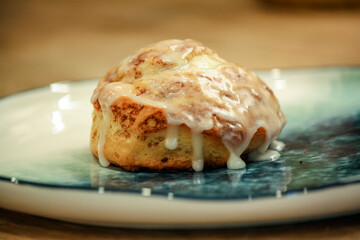 Delicious hot cinnamon roll with icing 